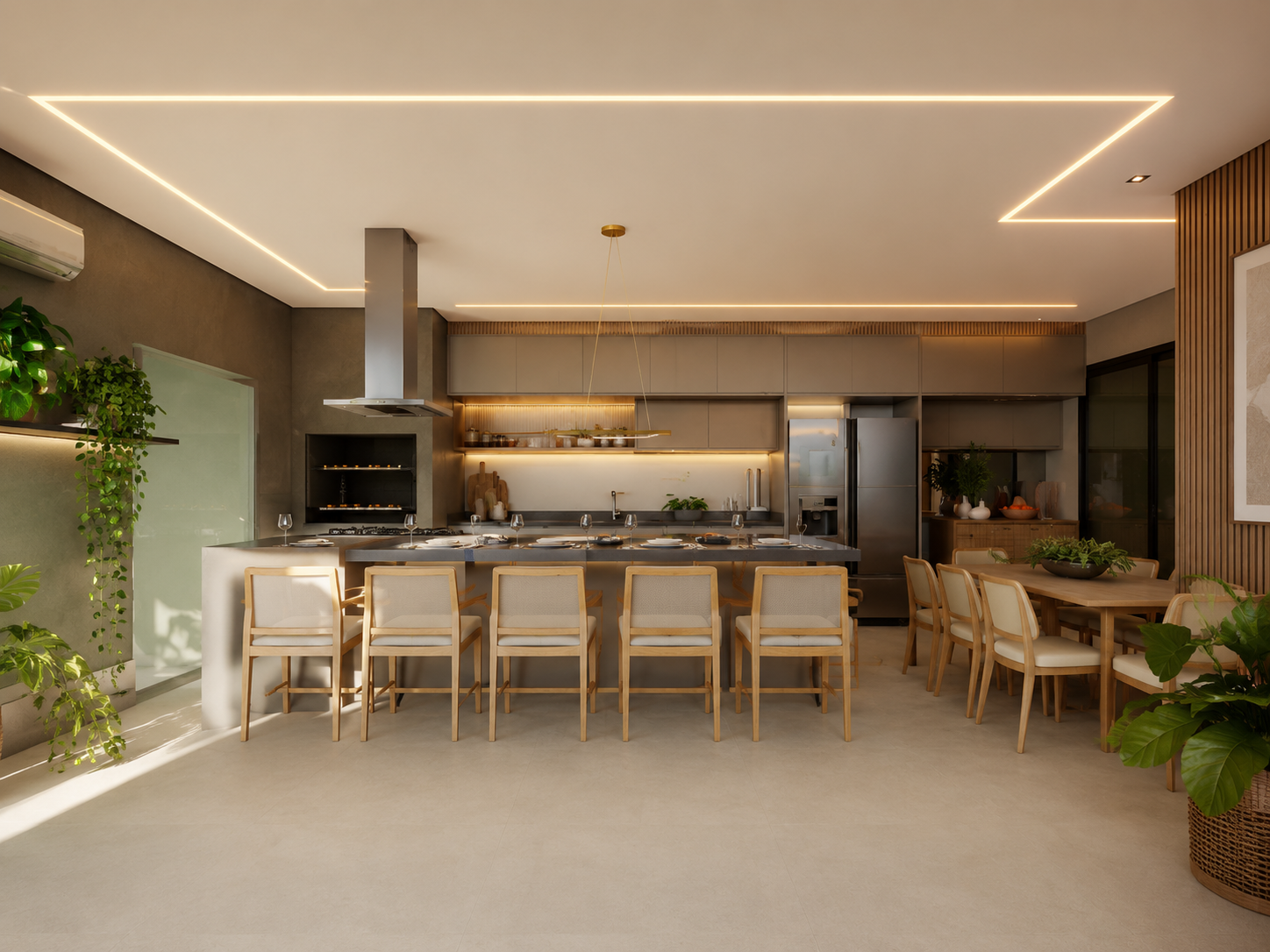 Cozinha gourmet integrada com ilha, coifa em inox, iluminação em fita LED no forro em formato geométrico e mesa de jantar em madeira clara.